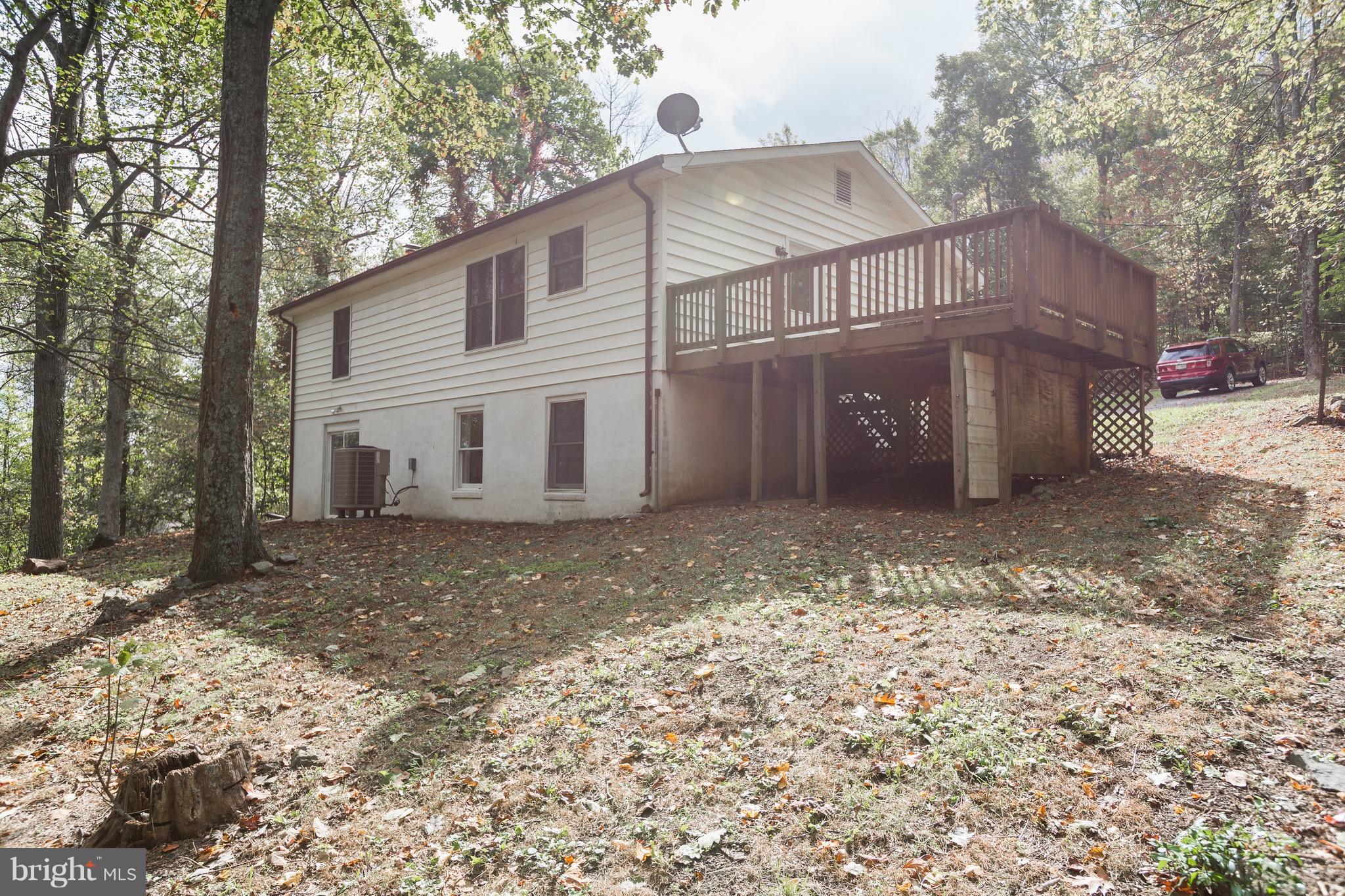 75 Locust Tree Lane Front Royal, VA 22630 - Photo 26 of 27 a view of a house with a yard
