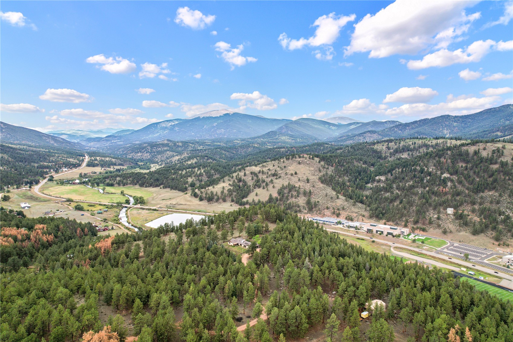 901 County Road 64 Bailey, CO 80421 - Photo 1 of 41 a view of lake with mountain