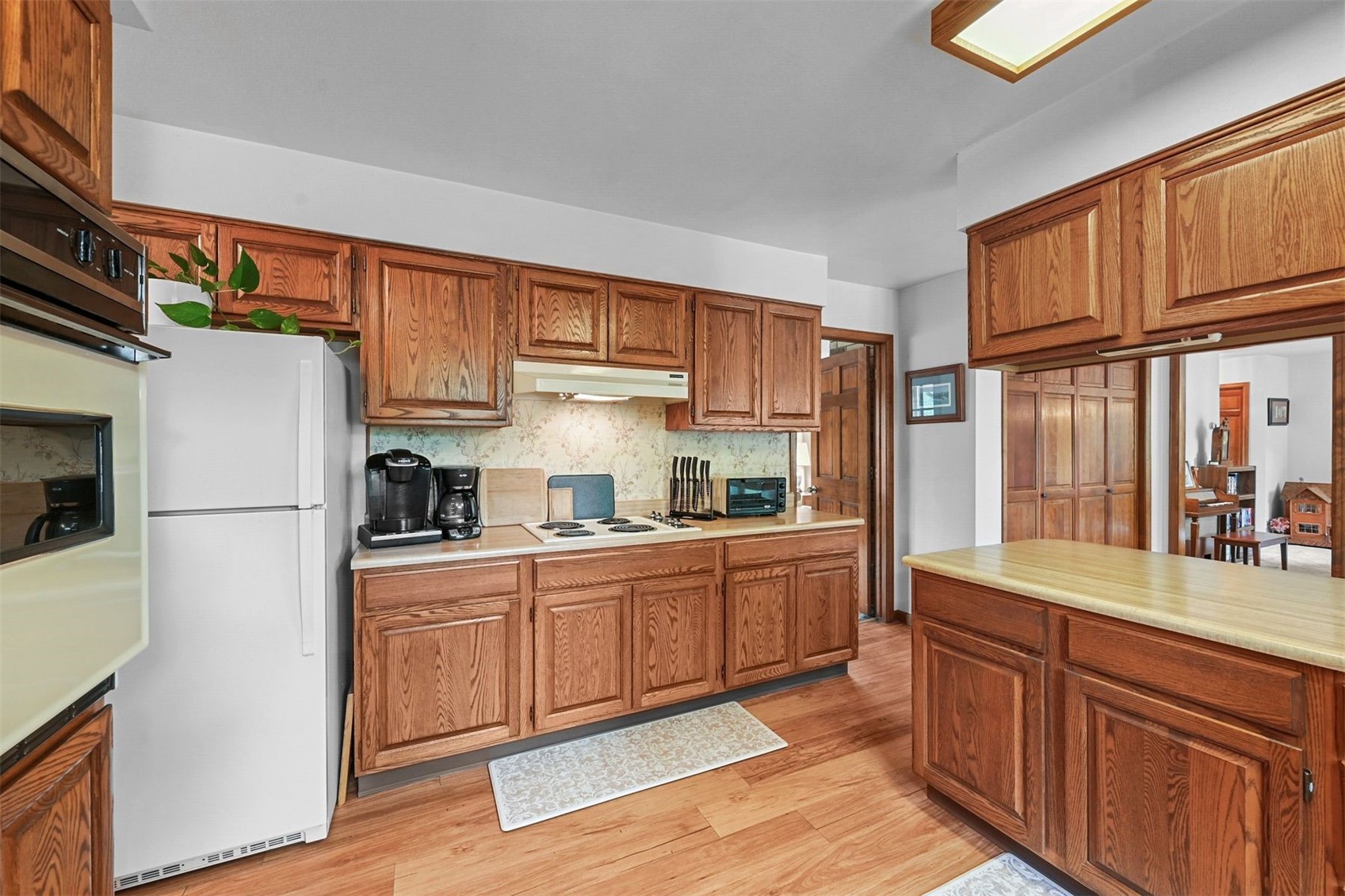901 County Road 64 Bailey, CO 80421 - Photo 13 of 41 a kitchen with stainless steel appliances granite countertop a refrigerator sink and cabinets