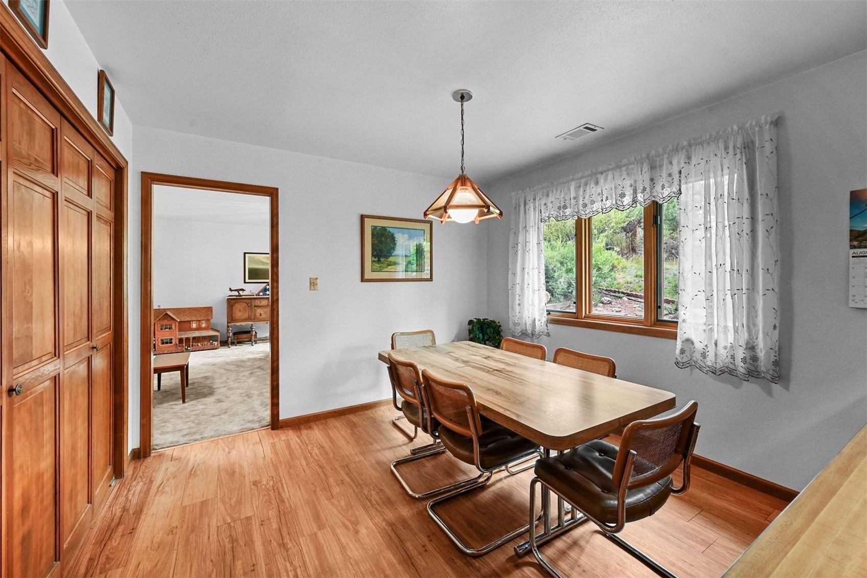 901 County Road 64 Bailey, CO 80421 - Photo 15 of 41 a view of a dining room with furniture window and wooden floor