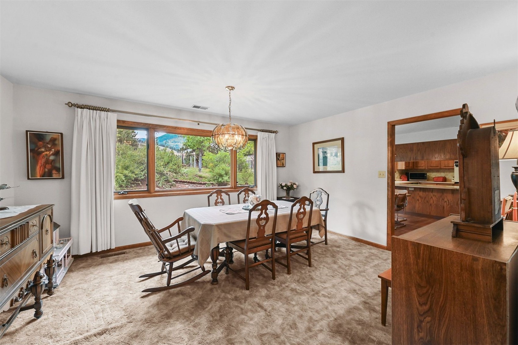 901 County Road 64 Bailey, CO 80421 - Photo 16 of 41 a view of a dining room with furniture window and outside view