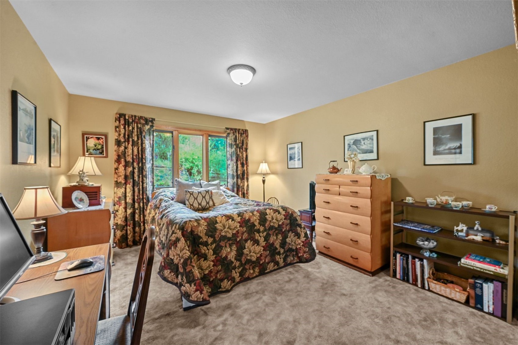 901 County Road 64 Bailey, CO 80421 - Photo 20 of 41 a bedroom with a bed and wooden floor