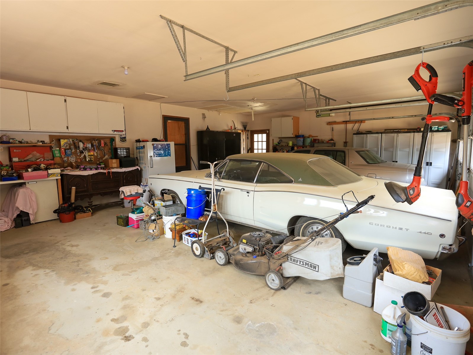 901 County Road 64 Bailey, CO 80421 - Photo 27 of 41 a view of a garage with parked cars