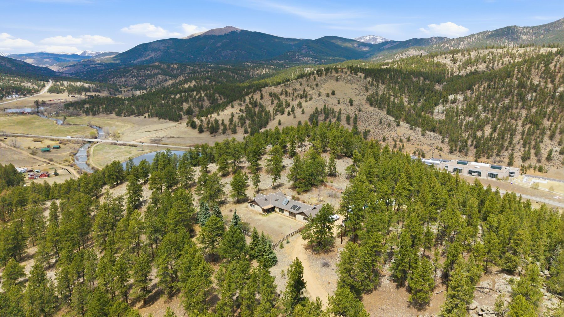 901 County Road 64 Bailey, CO 80421 - Photo 38 of 41 a view of a mountain with a lake