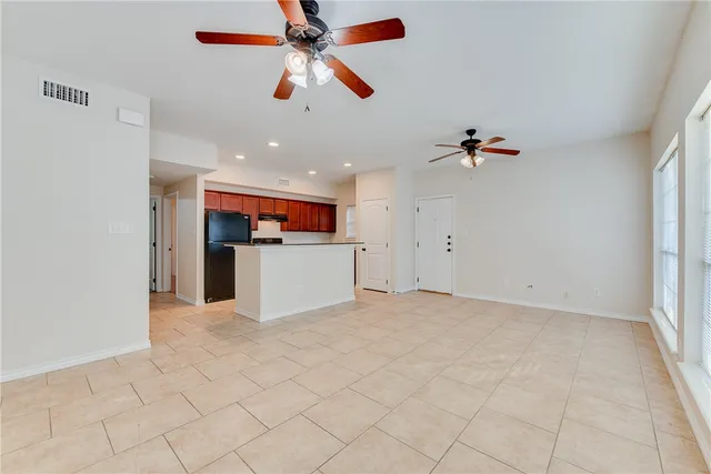 a view of a kitchen with a sink cabinets and window