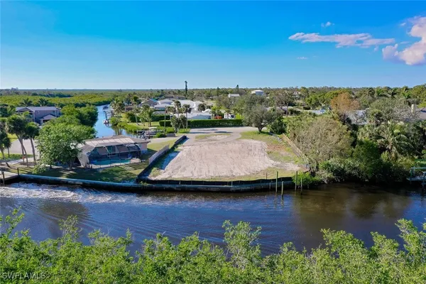 an aerial view of a house with a swimming pool