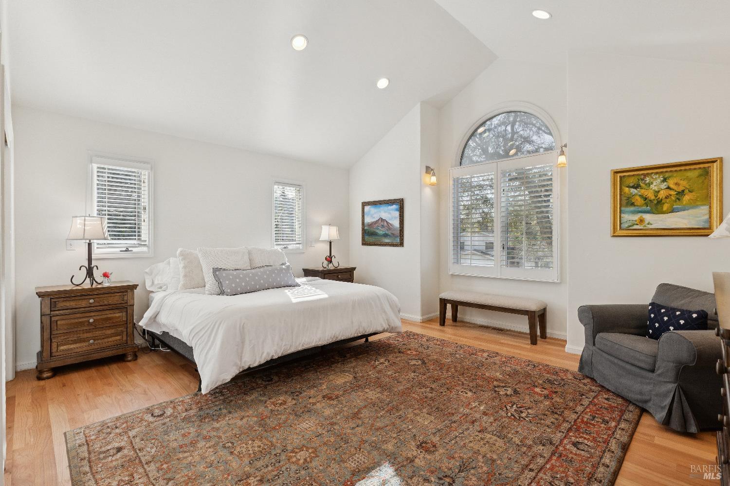 3556 Wood Valley Road Sonoma, CA 95476 - Photo 14 of 40 a spacious bedroom with a bed and a couch