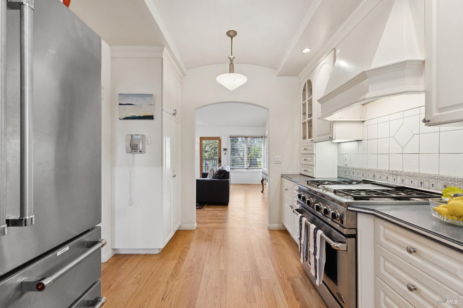 3556 Wood Valley Road Sonoma, CA 95476 - Photo 15 of 33 a kitchen with granite countertop a stove and a refrigerator
