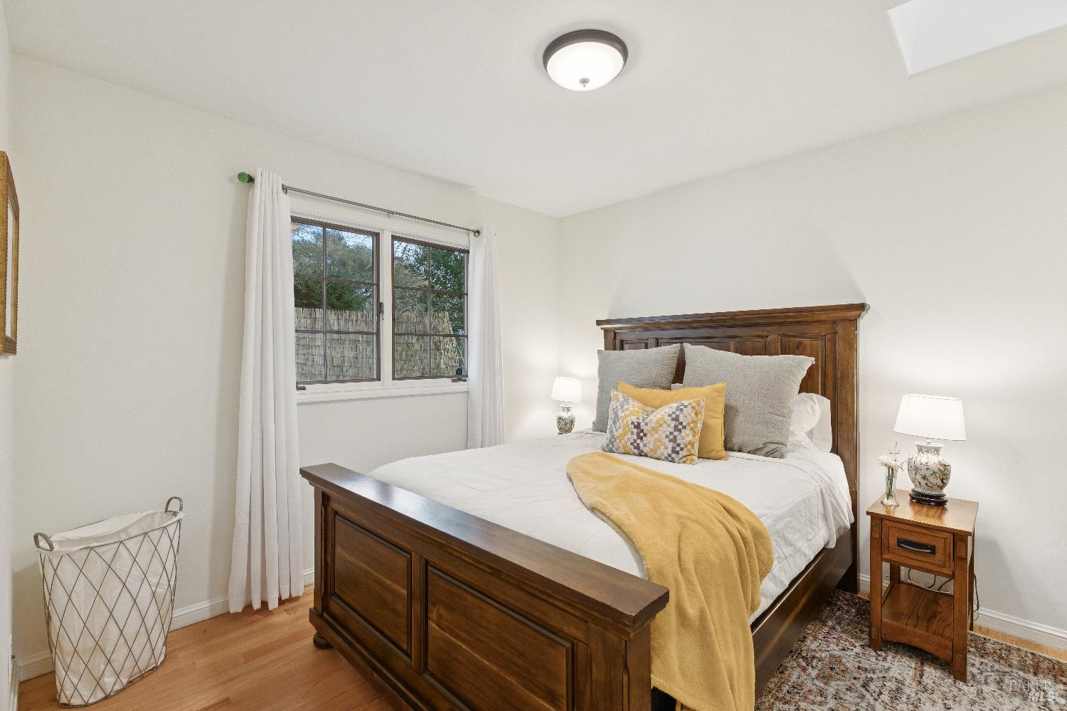 3556 Wood Valley Road Sonoma, CA 95476 - Photo 22 of 40 a bedroom with a bed and a window