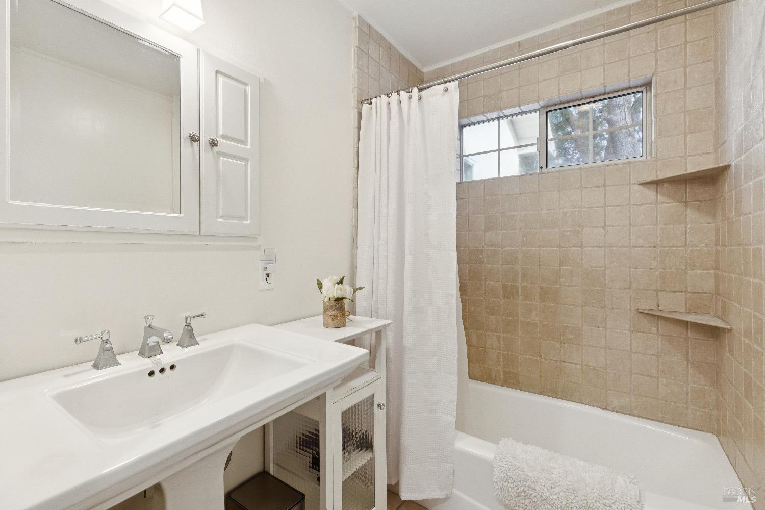 3556 Wood Valley Road Sonoma, CA 95476 - Photo 25 of 33 a bathroom with a sink and a mirror