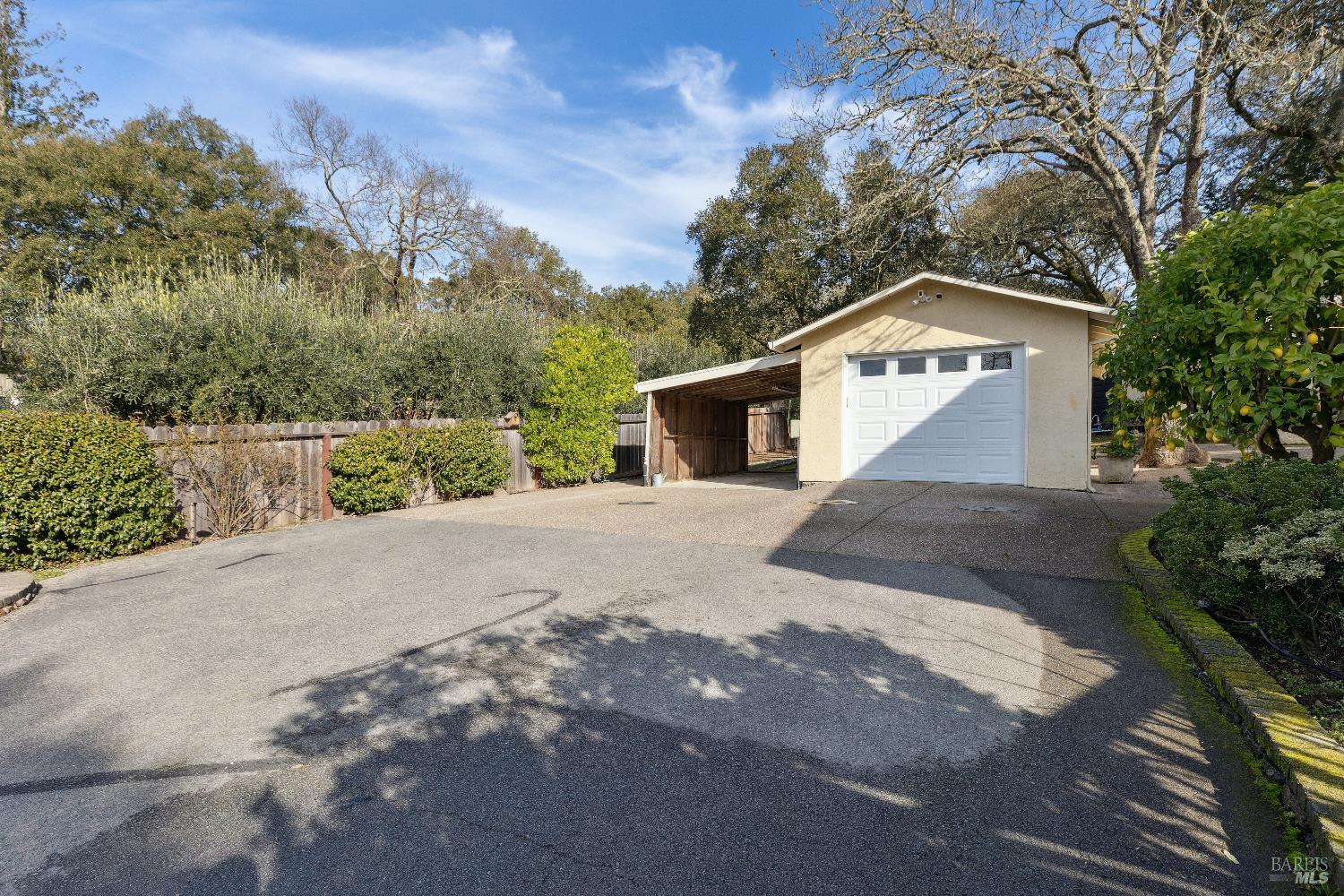 3556 Wood Valley Road Sonoma, CA 95476 - Photo 26 of 40 a view of a house with a yard