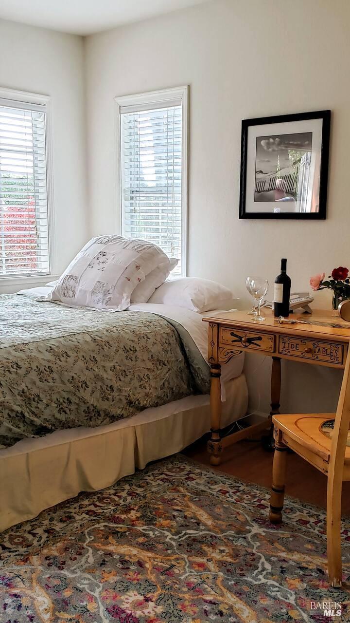 3556 Wood Valley Road Sonoma, CA 95476 - Photo 29 of 40 a bedroom with a bed and a window