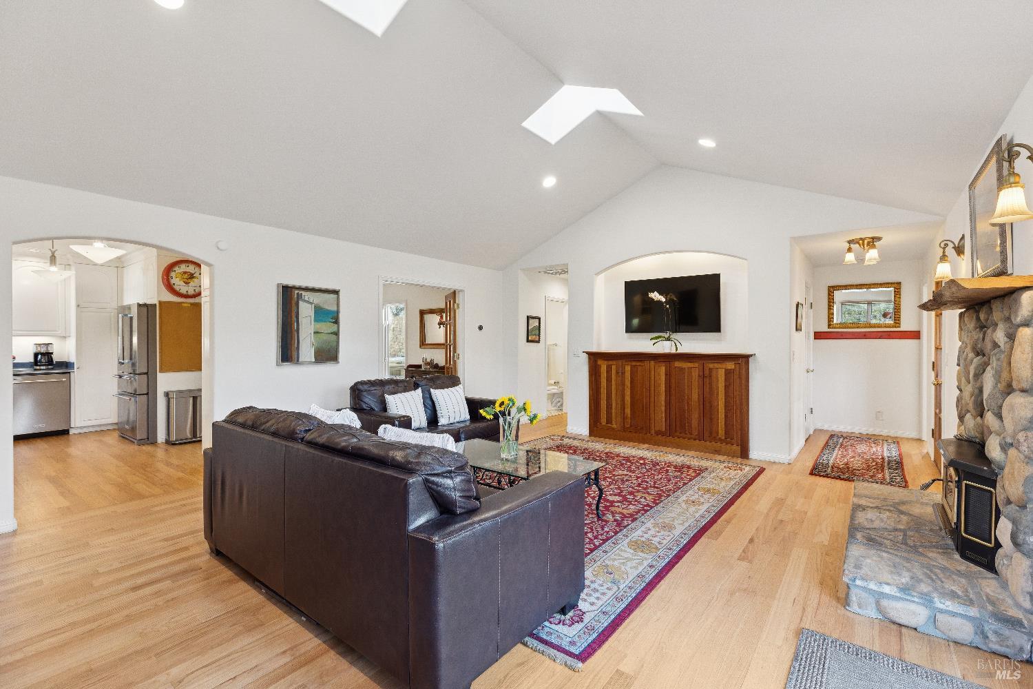 3556 Wood Valley Road Sonoma, CA 95476 - Photo 7 of 33 a living room with furniture and a flat screen tv
