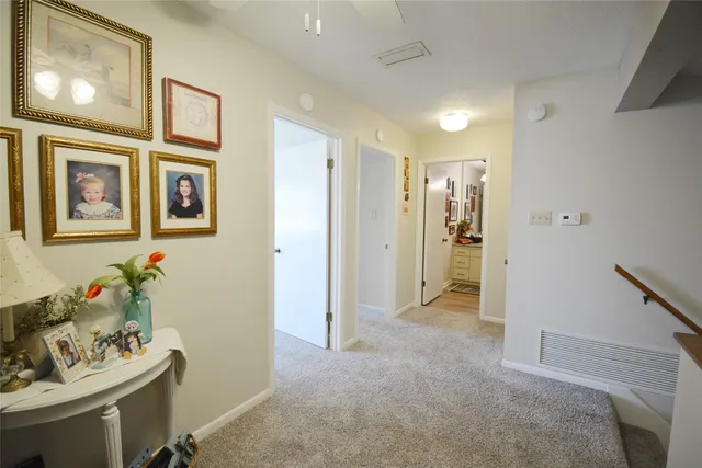 a bathroom with a toilet a sink and a shower