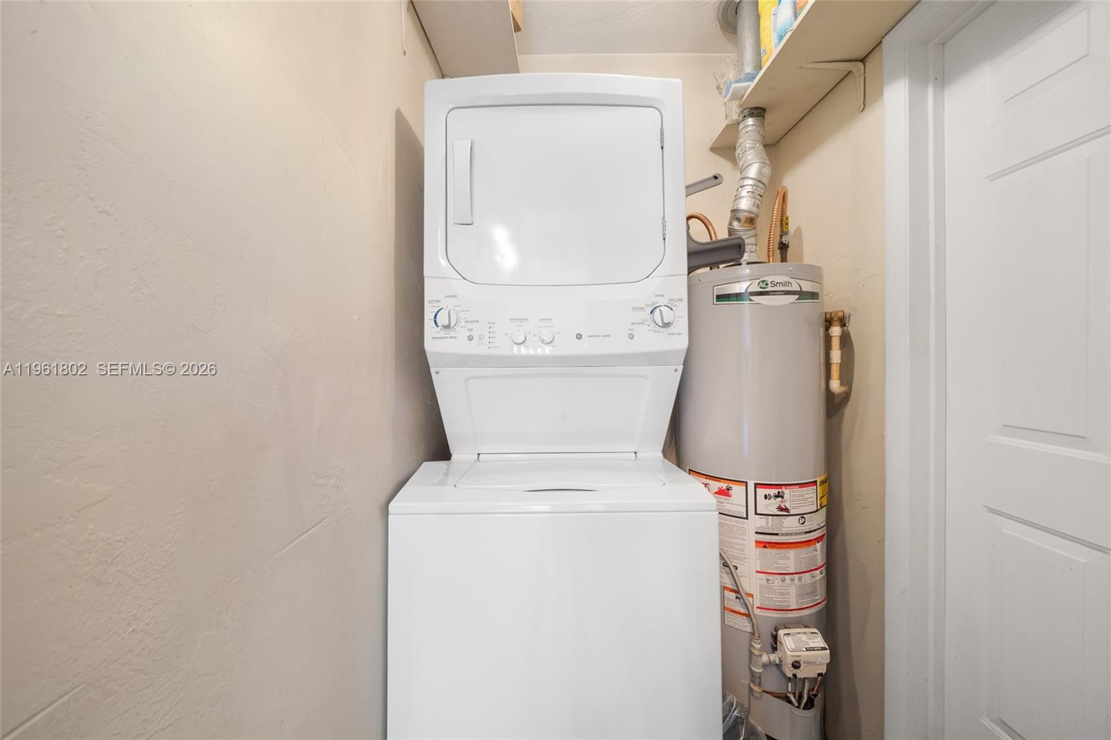 1166 West 24th Street Hialeah, FL 33010 - Photo 11 of 45 a utility room with dryer and washer