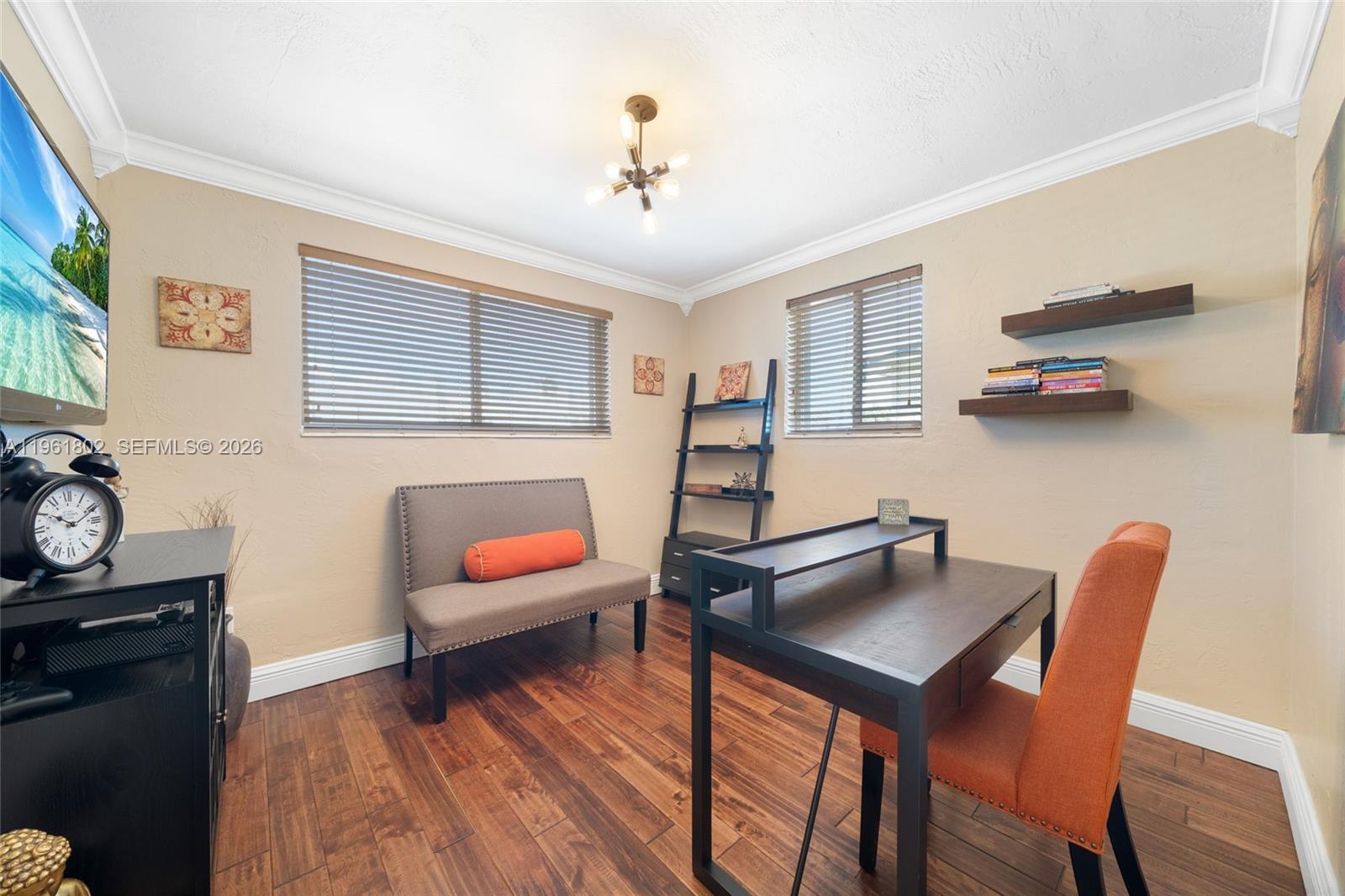 1166 West 24th Street Hialeah, FL 33010 - Photo 14 of 45 a living room with furniture and wooden floor