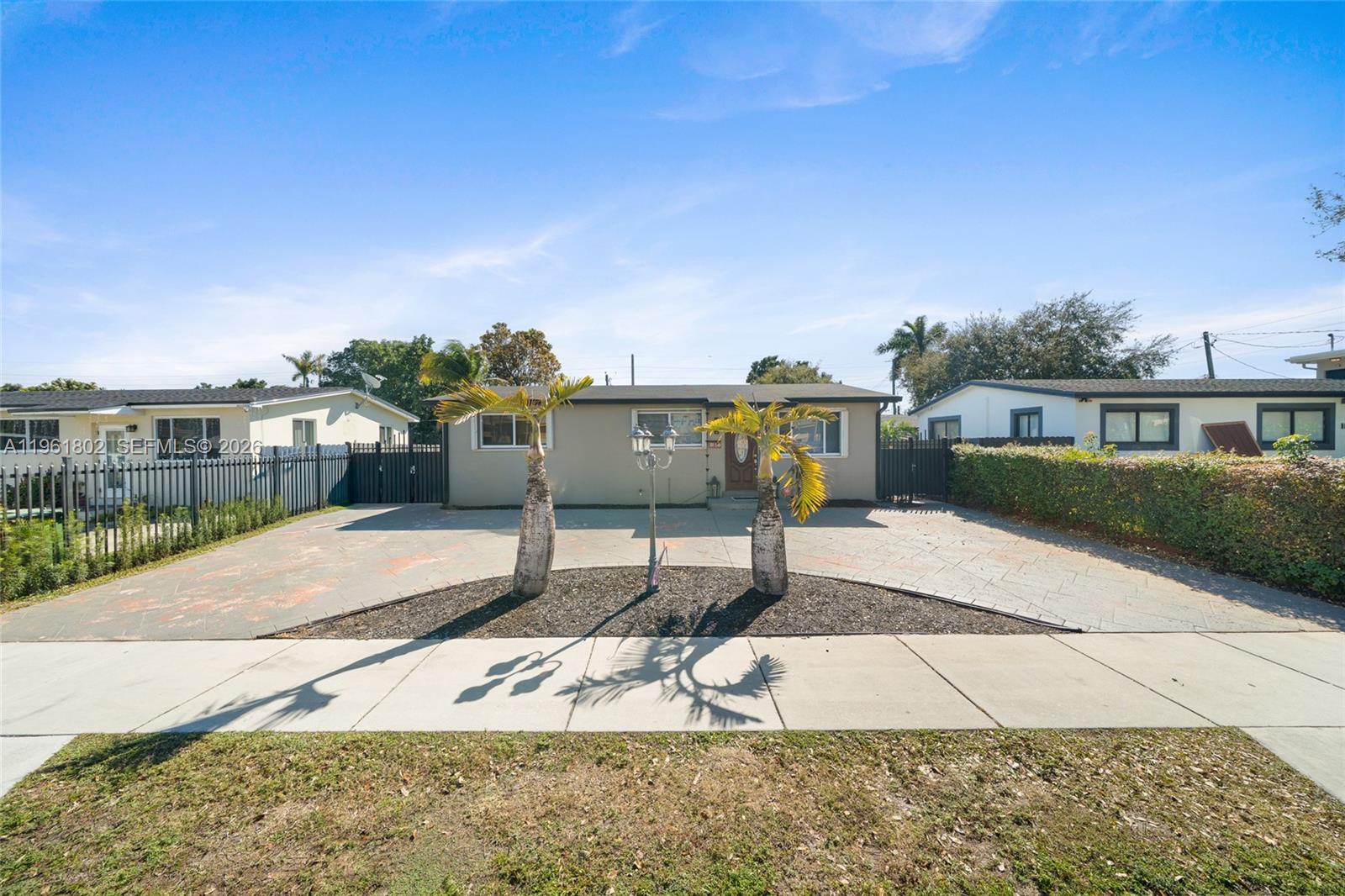 1166 West 24th Street Hialeah, FL 33010 - Photo 2 of 45 a view of a terrace with chairs