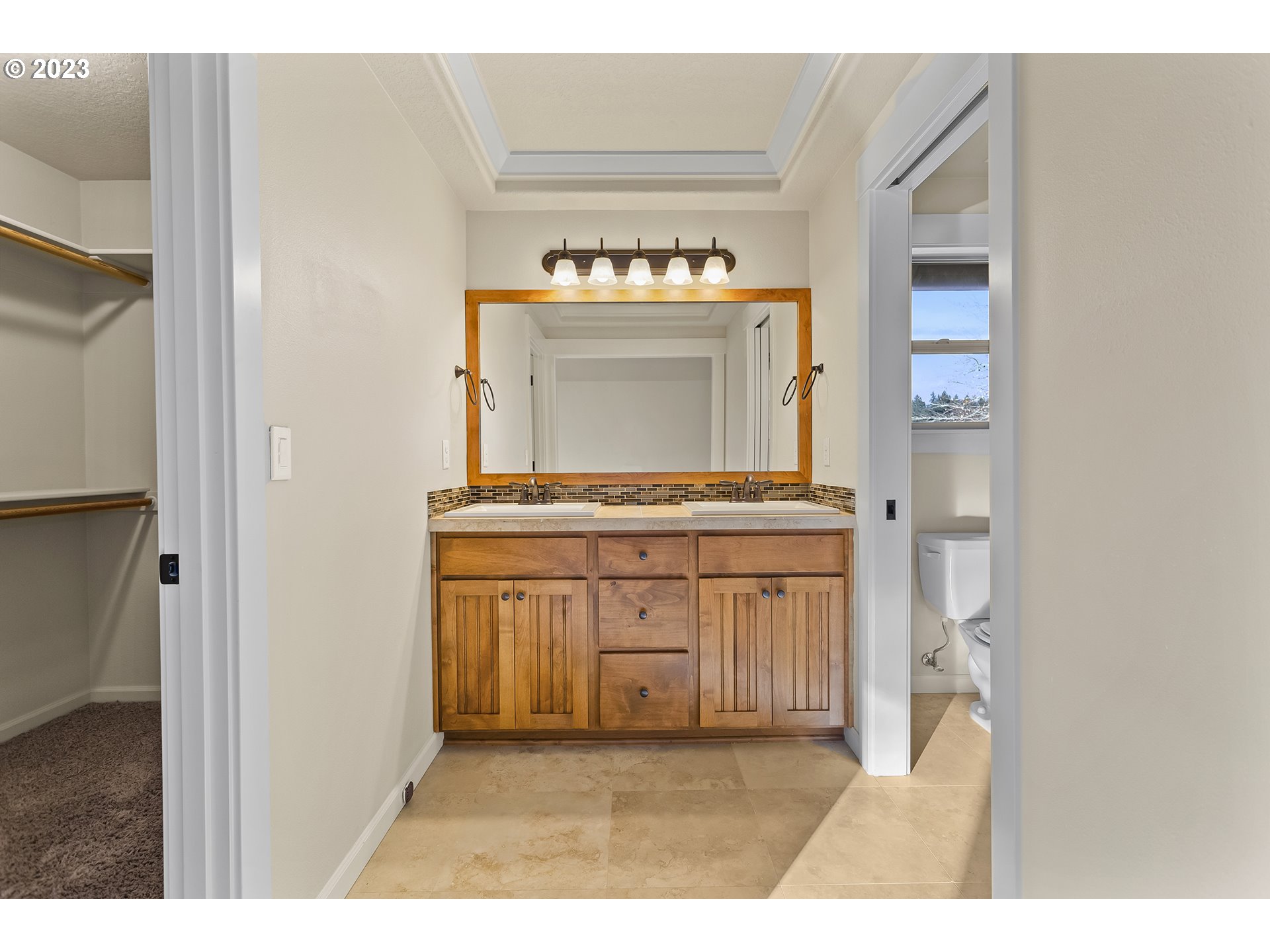 2267 Southwest 184th Terrace Beaverton, OR 97003 - Photo 20 of 39 a living room with a fireplace and a wooden floor