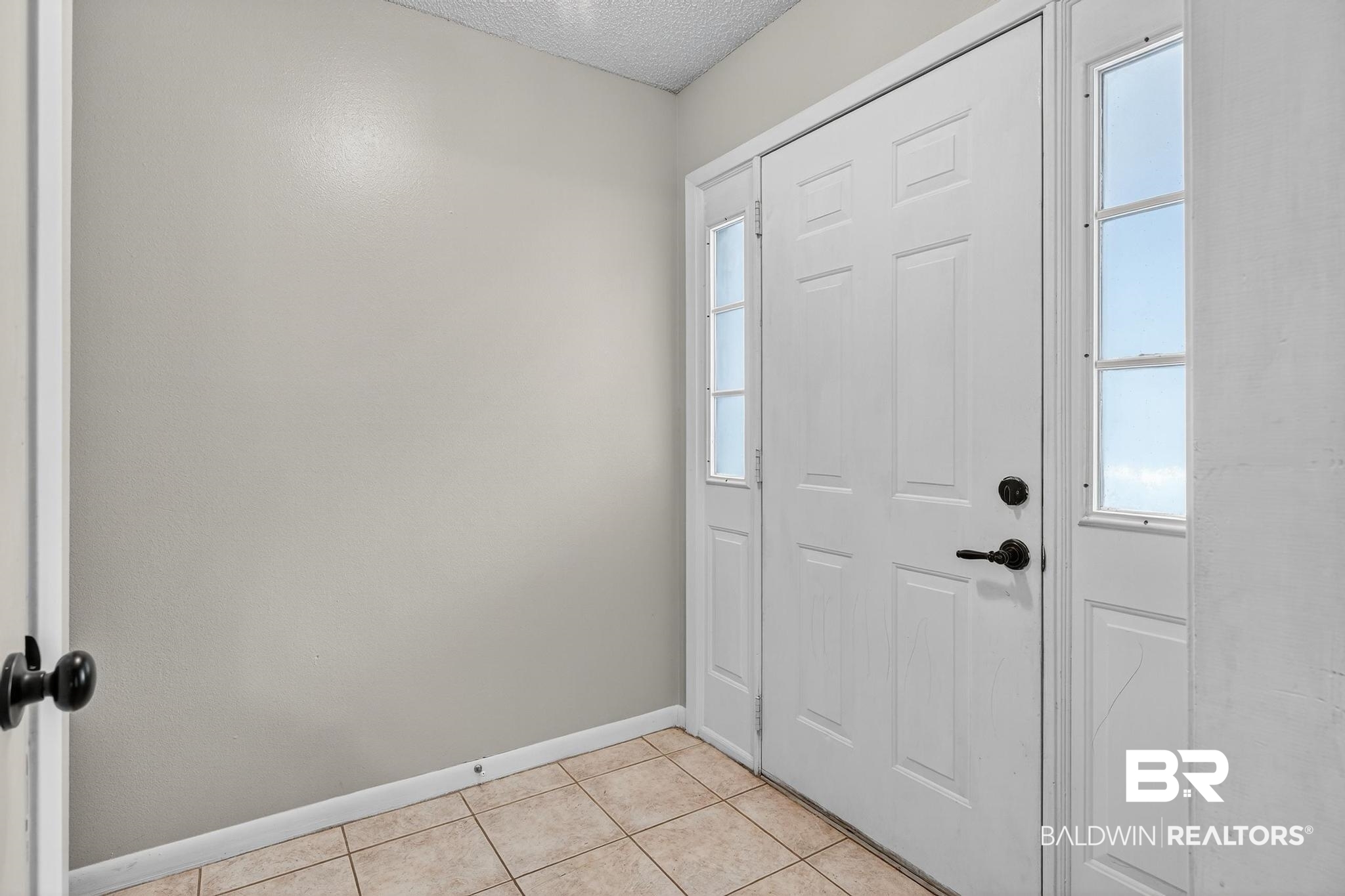 21895 2nd Street Silverhill, AL 36576 - Photo 16 of 43 Foyer featuring tile floors