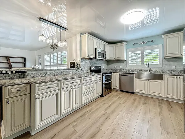 a bathroom with a shower and a sink