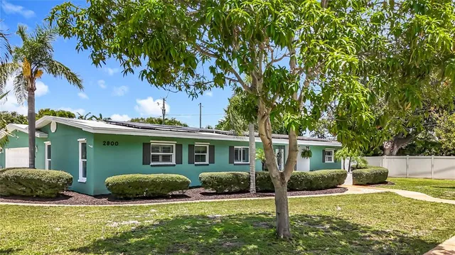a view of an ocean and city