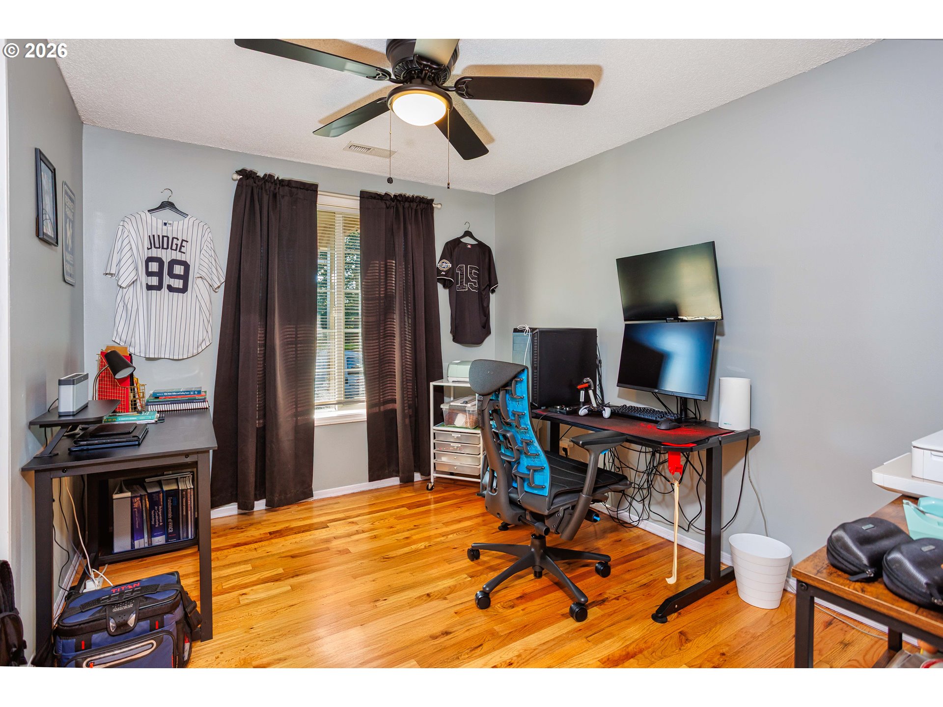 85 Northeast 23rd Street Gresham, OR 97030 - Photo 15 of 23 a view of a workspace with furniture and a flat screen tv