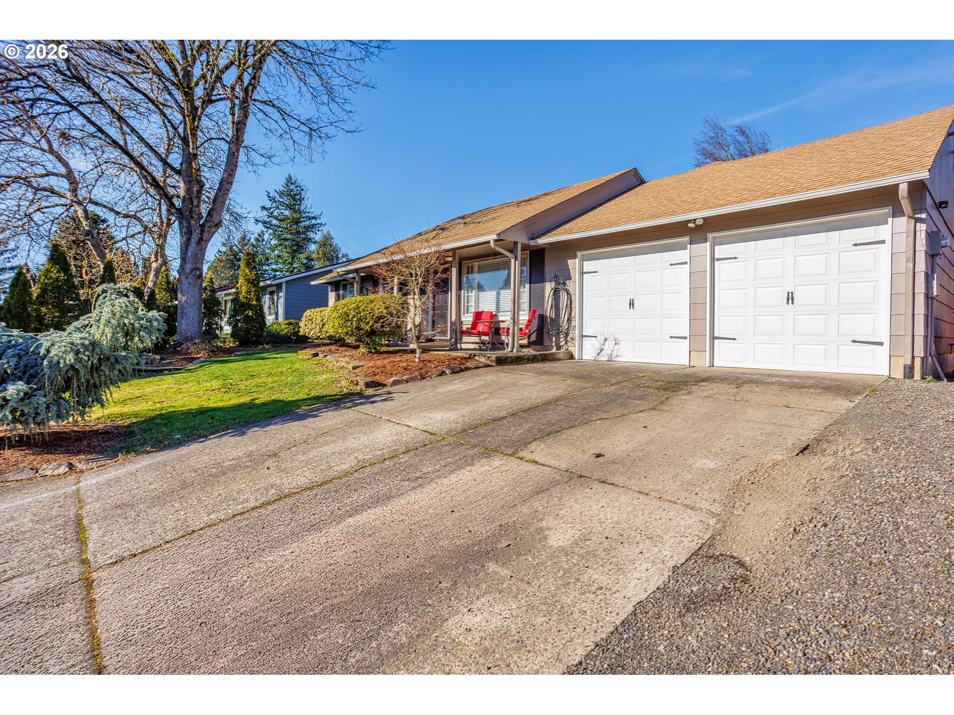 85 Northeast 23rd Street Gresham, OR 97030 - Photo 2 of 23 a view of a house with a yard and garage