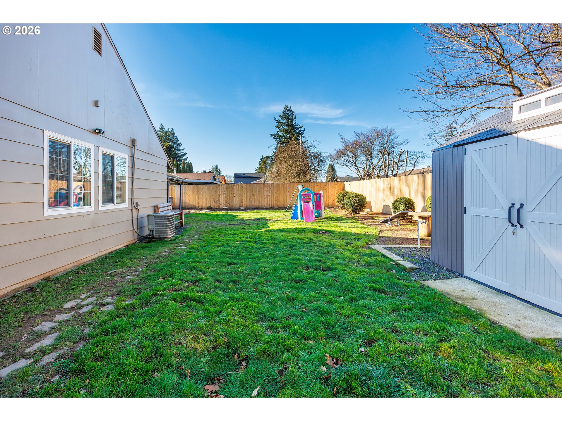 85 Northeast 23rd Street Gresham, OR 97030 - Photo 22 of 23 a view of an house with backyard space and garden