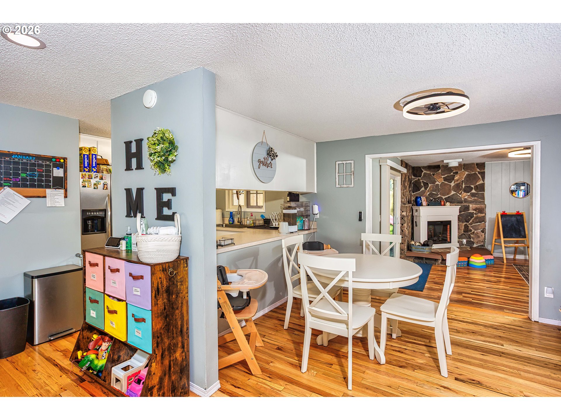 85 Northeast 23rd Street Gresham, OR 97030 - Photo 6 of 23 a view of a dining room with furniture and wooden floor