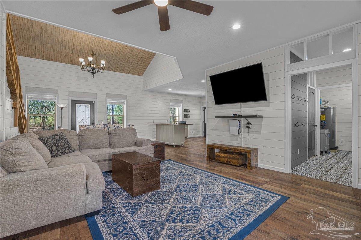 1660 Annie Penton Road Jay, FL 32565 - Photo 17 of 56 a living room with furniture and a flat screen tv