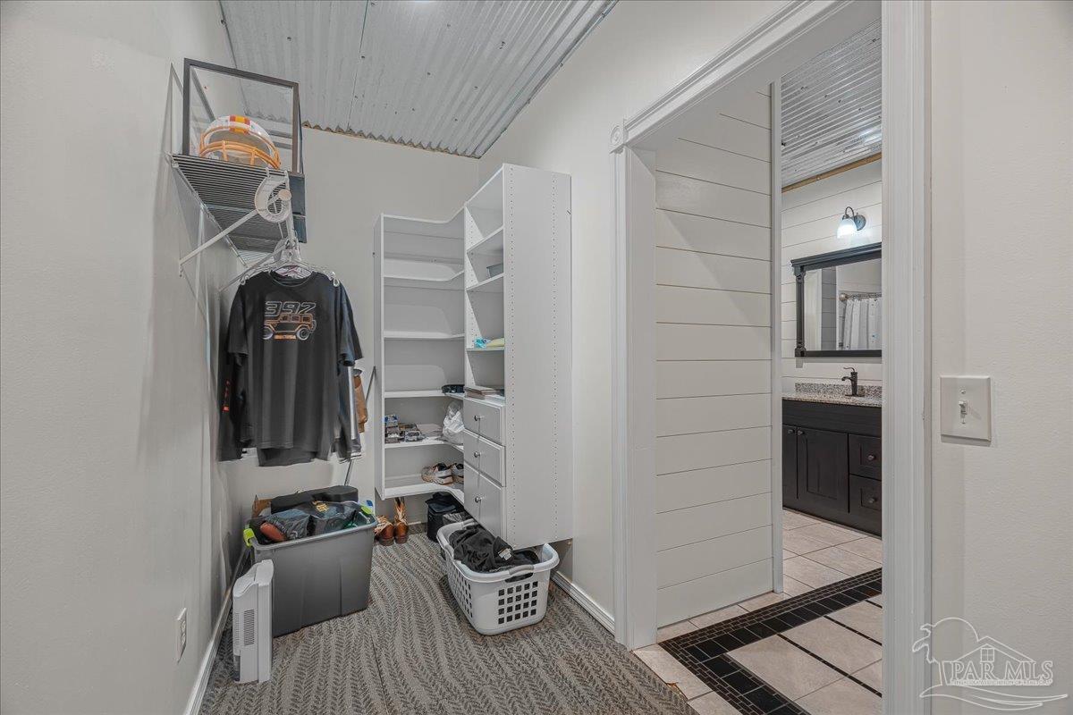 1660 Annie Penton Road Jay, FL 32565 - Photo 34 of 56 a view of a workspace with furniture and staircase