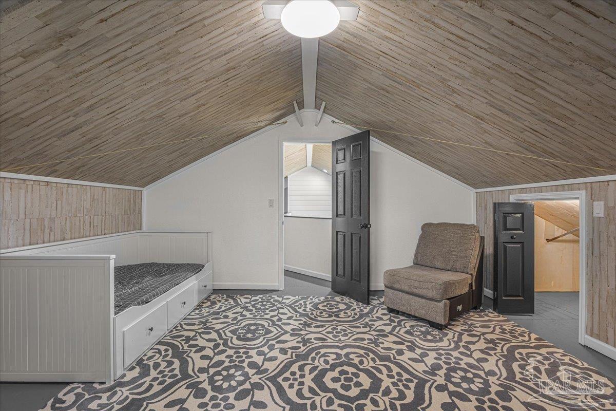 1660 Annie Penton Road Jay, FL 32565 - Photo 44 of 56 a living room with furniture and a rug