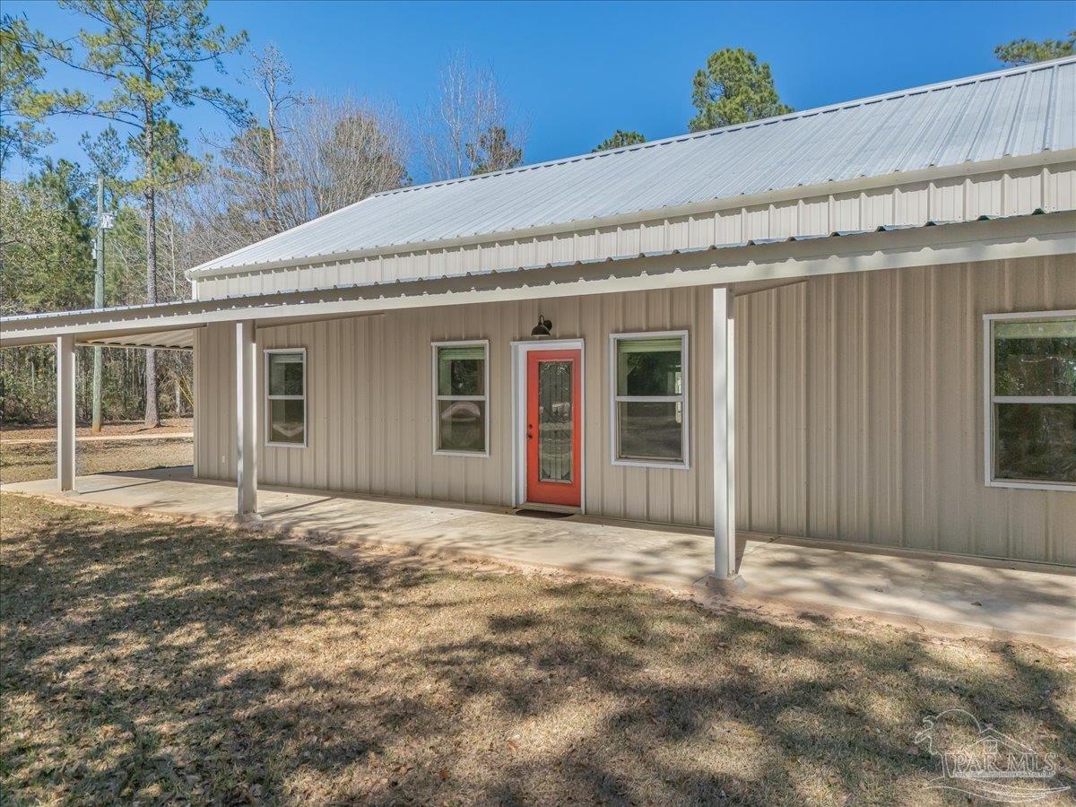 1660 Annie Penton Road Jay, FL 32565 - Photo 7 of 56 a backyard of a house