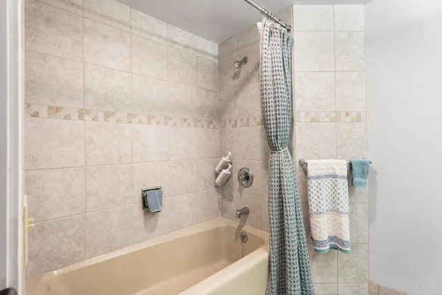 a bathroom with a bathtub