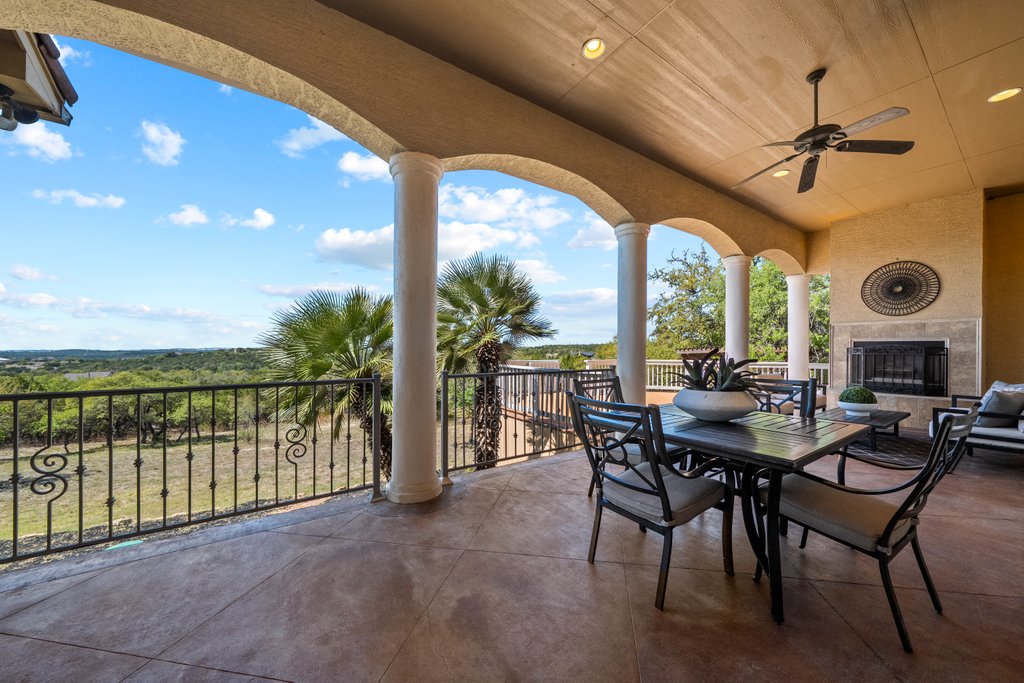 143 Champion Way Spring Branch, TX 78070 - Photo 28 of 40 a dining room with furniture and a floor to ceiling window