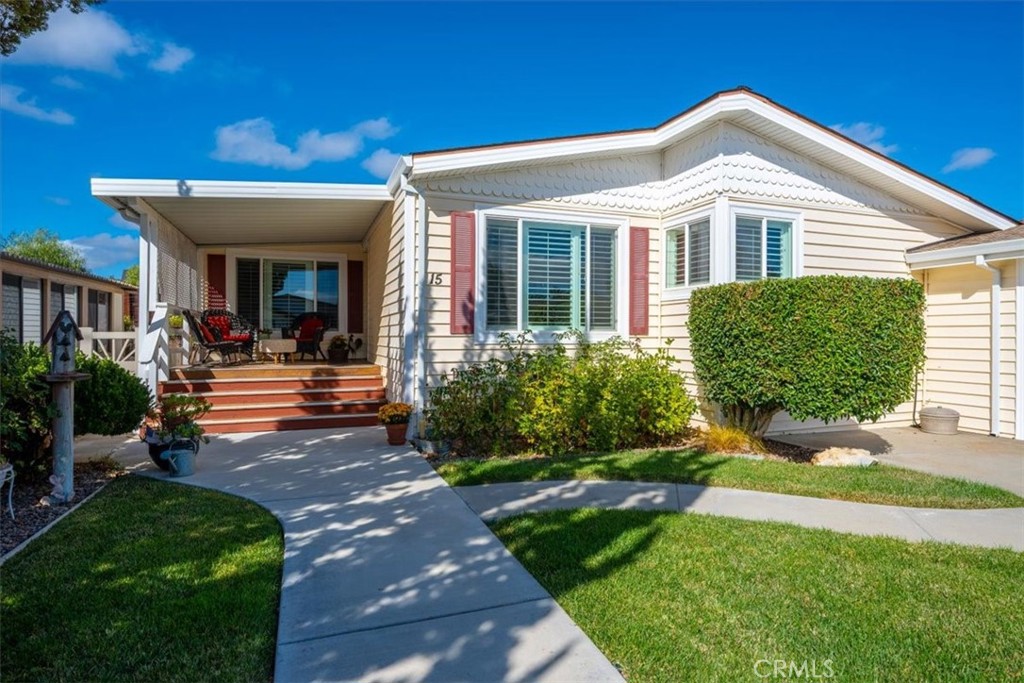 1220 Bennett, Unit 15 Templeton, CA 93465 - Photo 1 of 1 a front view of a house with a yard