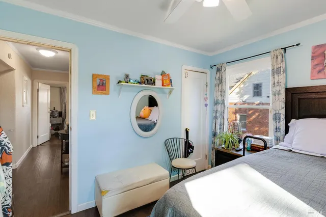 a view of living room with furniture and a flat screen tv