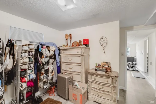 a bathroom with a shower sink and mirror