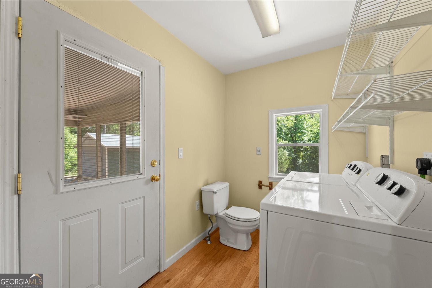 110 Riverside Drive Washington, GA 30673 - Photo 8 of 29 a bathroom with a toilet sink and mirror