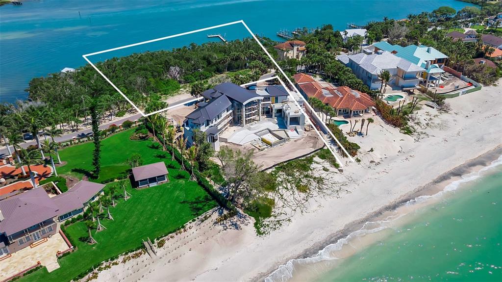 2542 Casey Key Road Nokomis, FL 34275 - Photo 11 of 14 an aerial view of a house with a garden