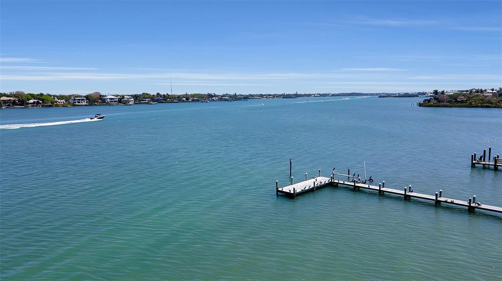 2542 Casey Key Road Nokomis, FL 34275 - Photo 14 of 14 an ocean beach with seating space