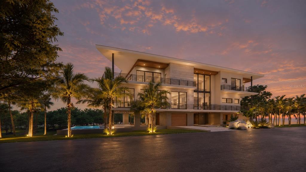2542 Casey Key Road Nokomis, FL 34275 - Photo 3 of 14 a front view of a building with streets and trees