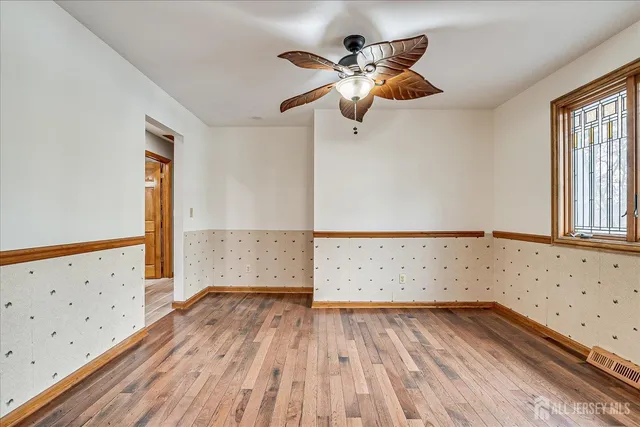 a kitchen with stainless steel appliances granite countertop a stove refrigerator sink and microwave