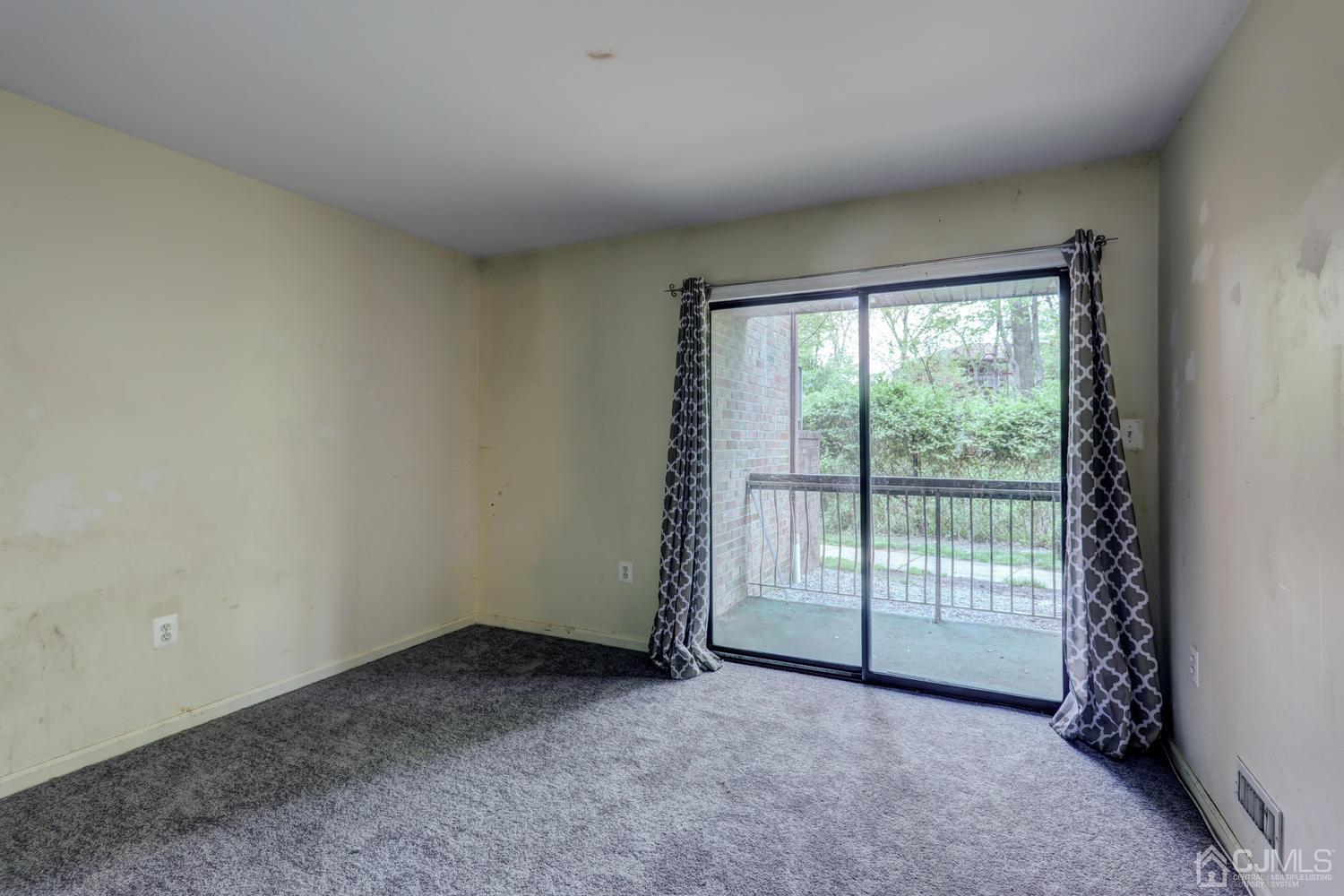 1914 Raspberry Court Edison, NJ 08817 - Photo 22 of 26 an empty room with windows