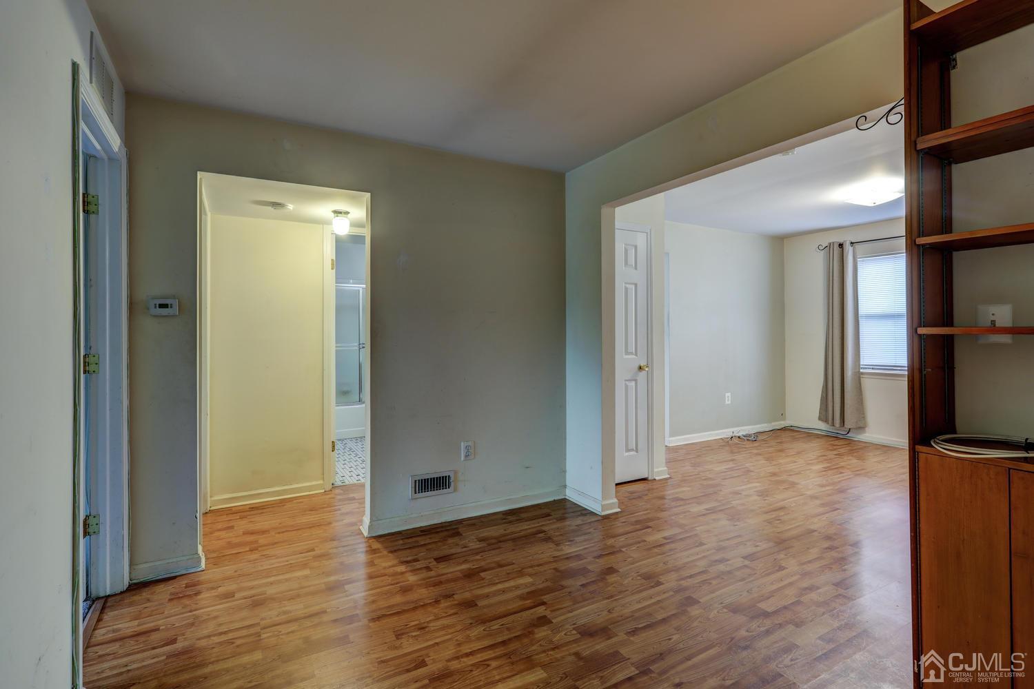 1914 Raspberry Court Edison, NJ 08817 - Photo 8 of 26 a view of hallway with wooden floor