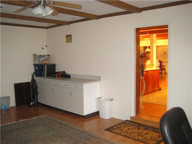 950 Southport Road Mount Pleasant, TN 38474 - Photo 14 of 20 This bonus space is just off the kitchen... it would be great as an exercise room, office, family room, game room... the options are limitless! And a separate entry/exit makes it very convenient...