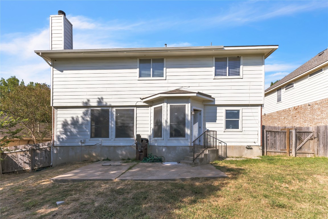 3733 Eagles Nest Street Round Rock, TX 78665 - Photo 19 of 19 a front view of a house with garden