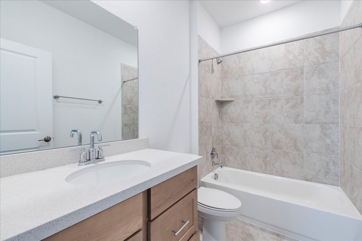 108 Makinaw Road Hutto, TX 78634 - Photo 11 of 34 Downstairs guest bathroom