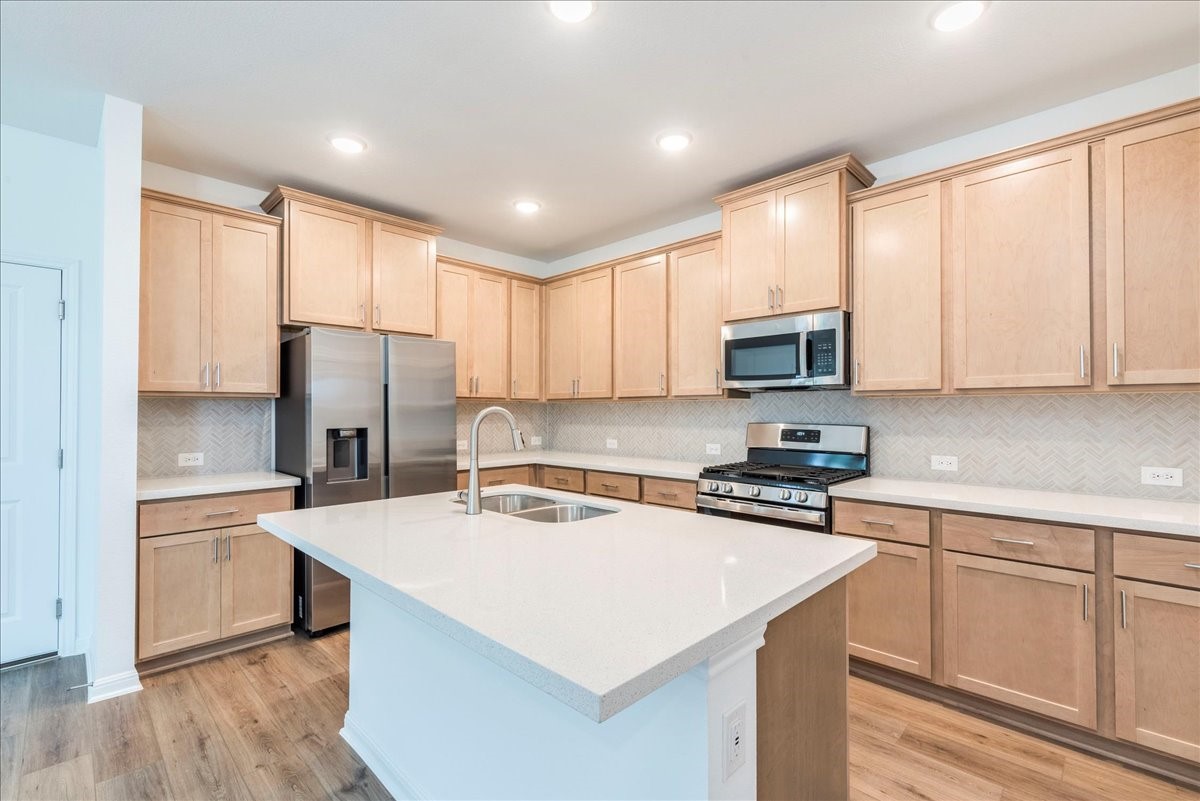 108 Makinaw Road Hutto, TX 78634 - Photo 3 of 34 Quartz Countertops!