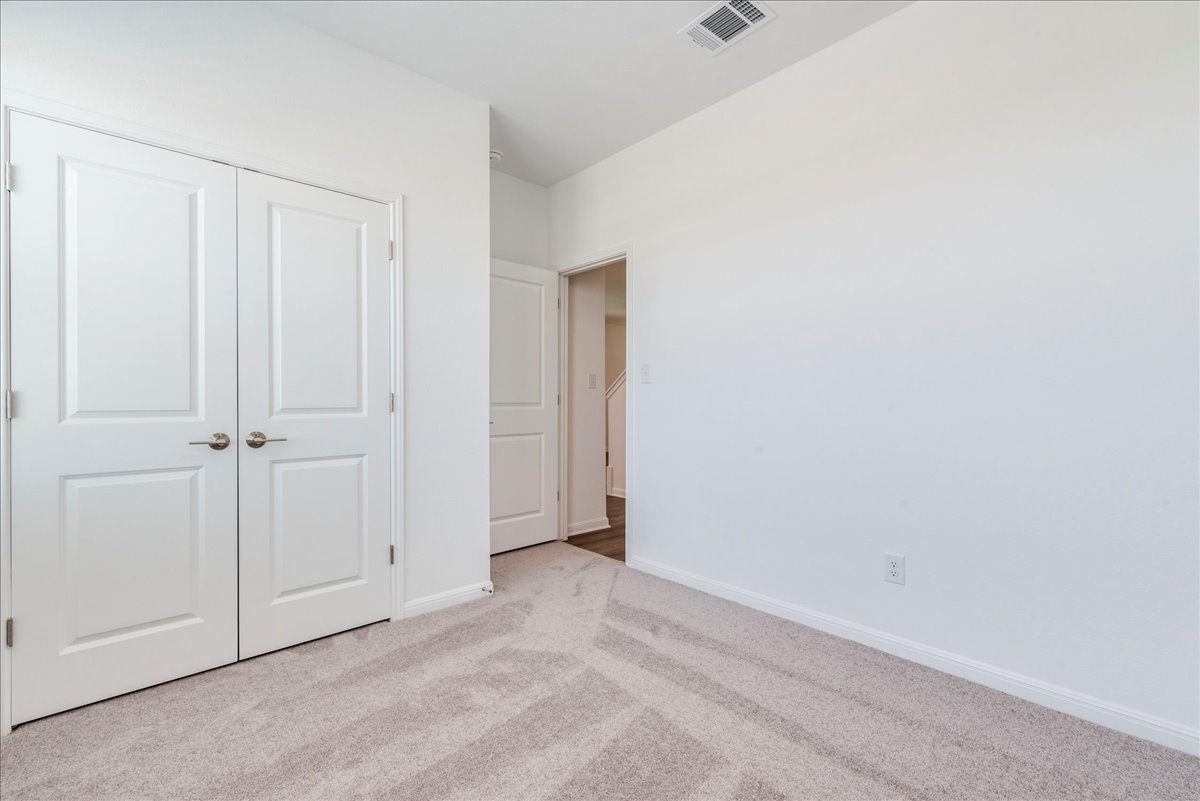108 Makinaw Road Hutto, TX 78634 - Photo 10 of 34 Downstairs bedroom/flexroom/office